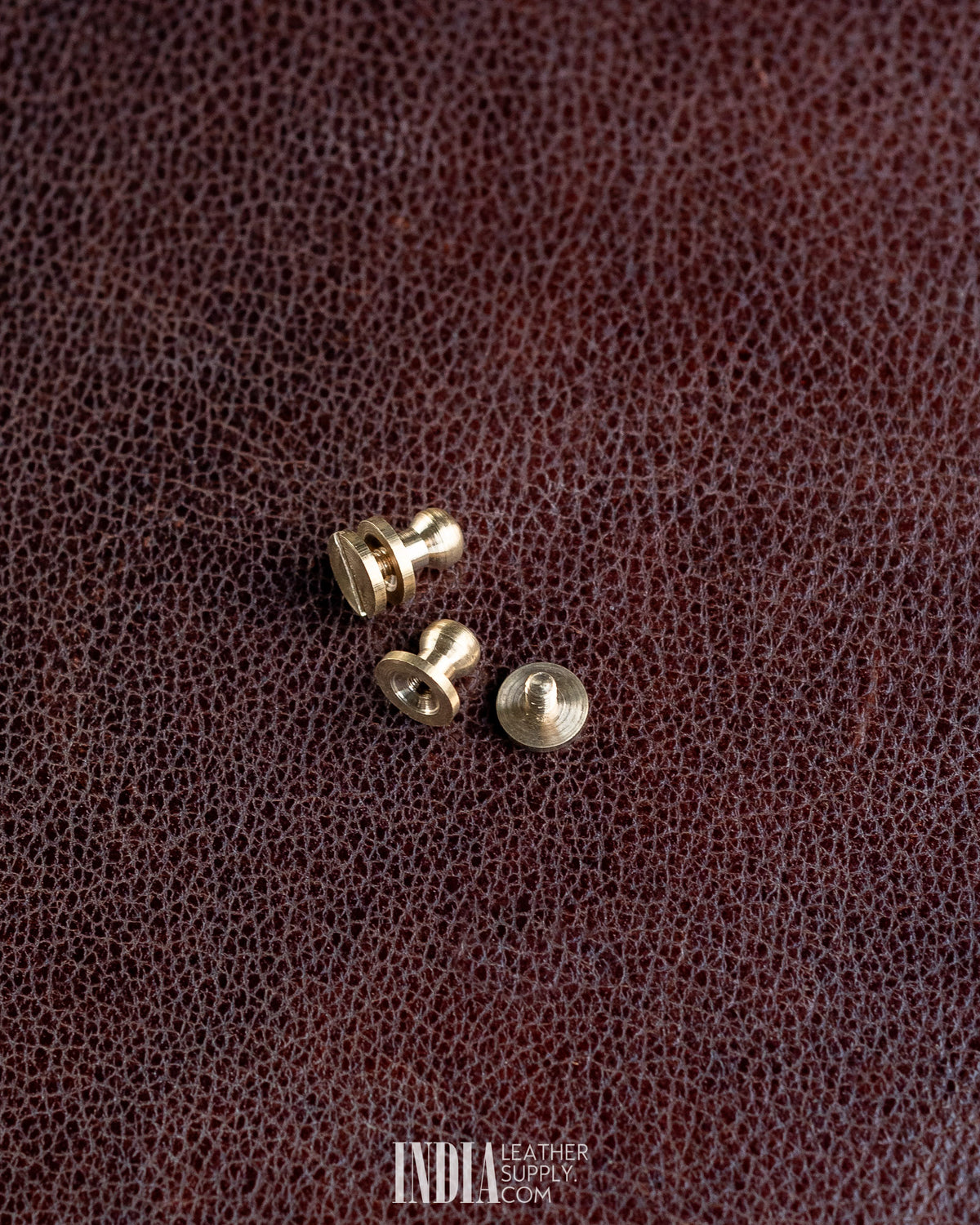 Solid brass button stud parts, ~6 mm rounded head | India Leather Supply