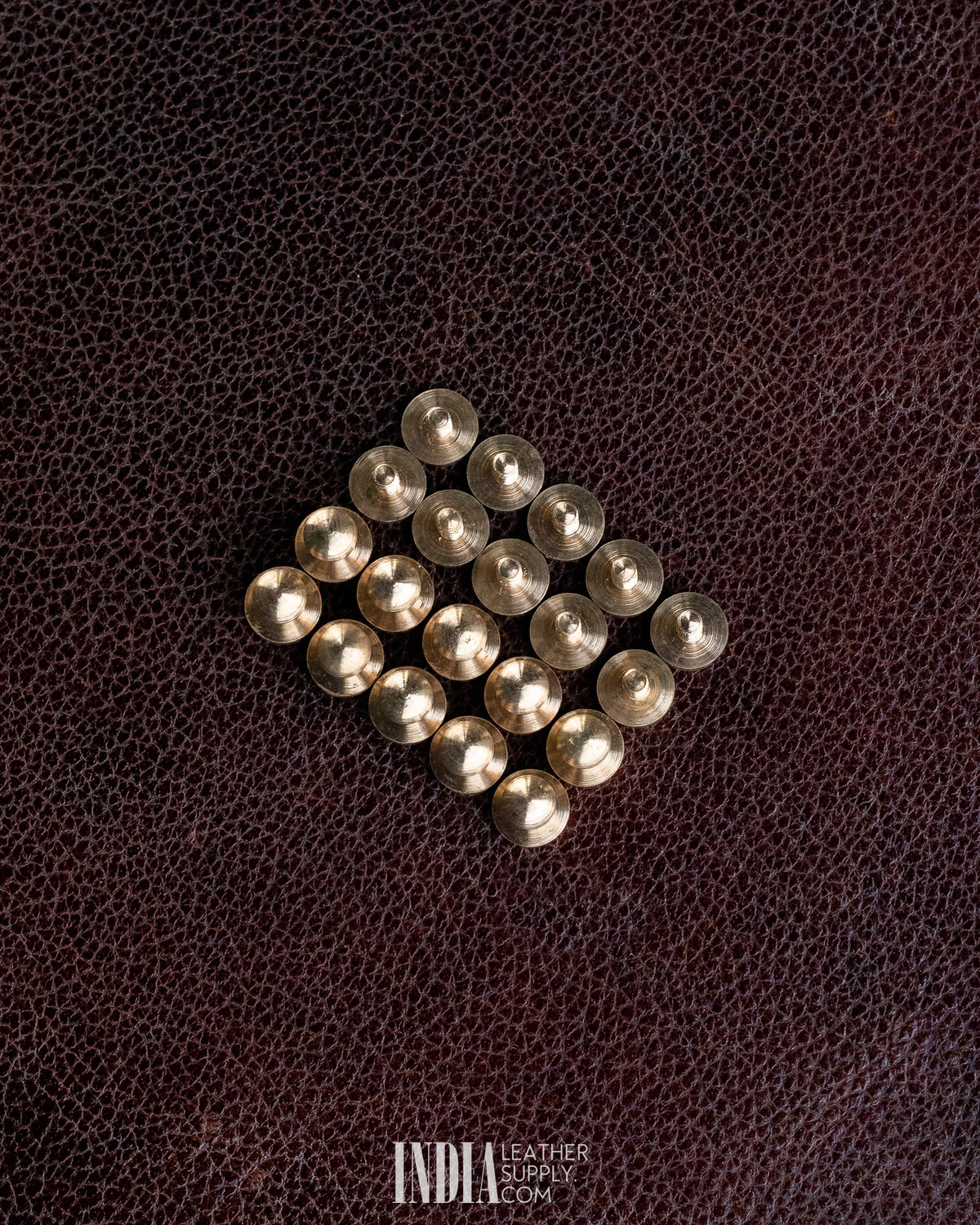 Solid brass button studs, rounded heads in rows | India Leather Supply