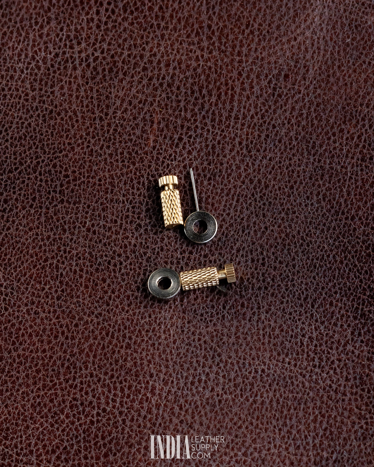 Brass positioning needle shown open with needle exposed and closed in its pipe