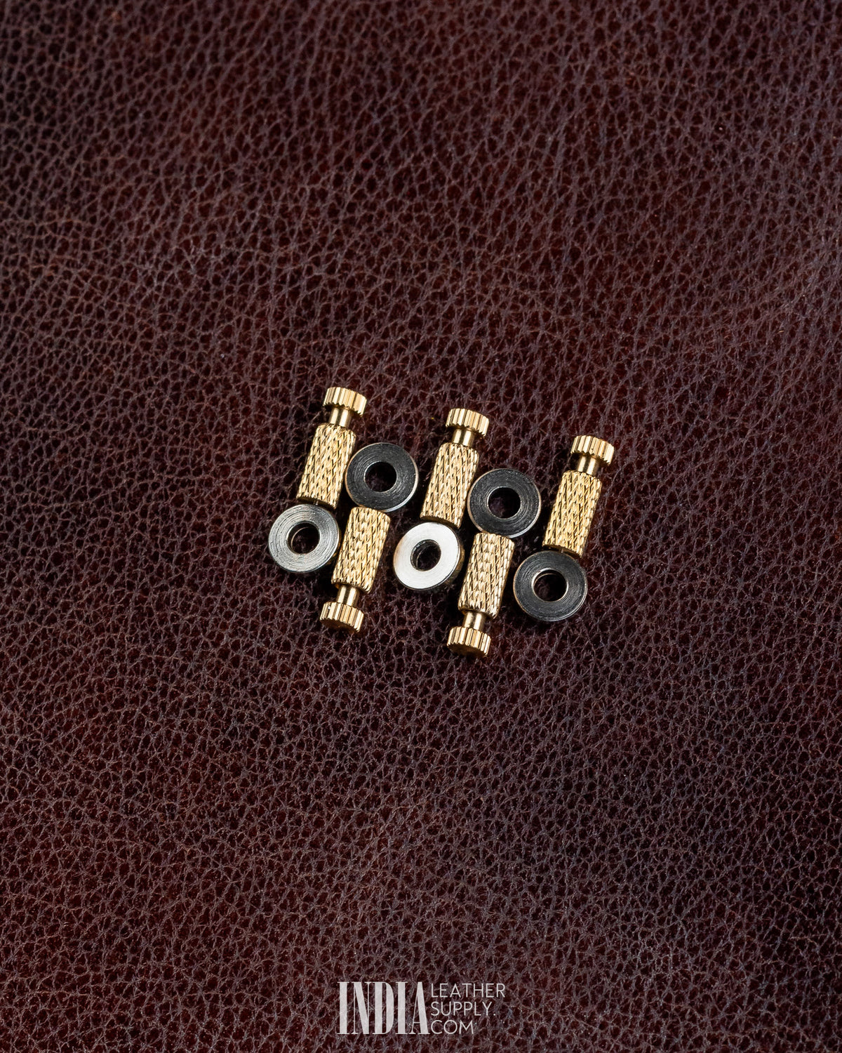 Pack of 5 brass positioning needles with washers